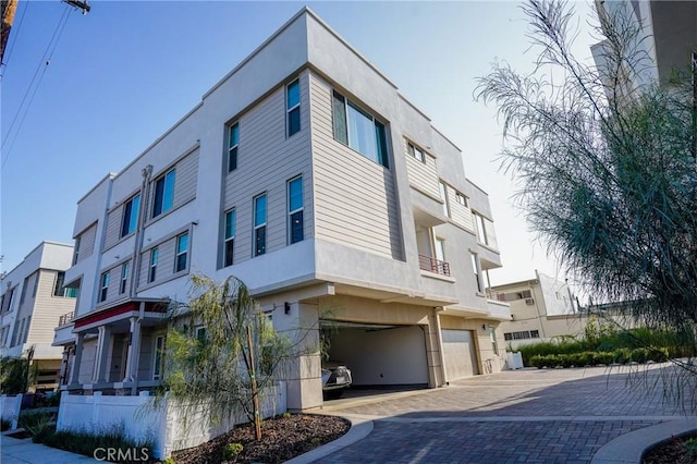 137 Saint Francis St Unit A, San Gabriel, CA 91776 - view of property with a garage, driveway, and a residential view