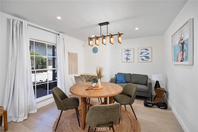 108 Bennett Ave, Long Beach, CA 90803 - dining room featuring light wood-style floors, recessed lighting, and a chandelier