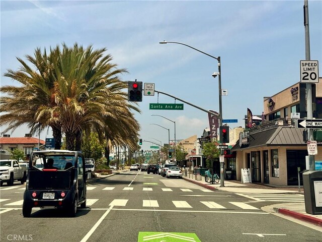 108 Bennett Ave, Long Beach, CA 90803 - view of asphalt street with traffic lights, curbs, street lights, sidewalks, and traffic signs