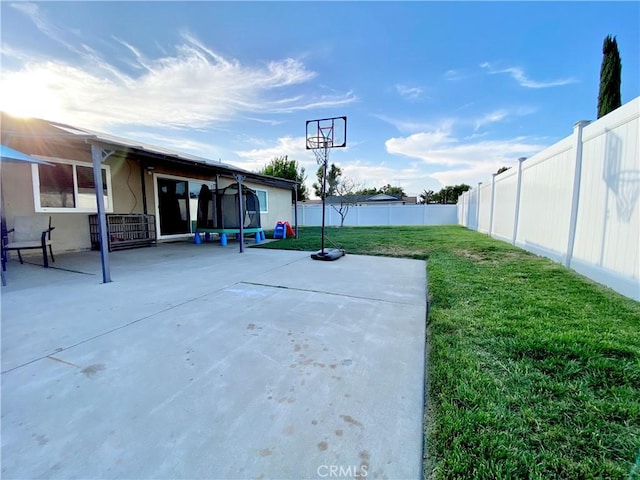 743 N Beechwood Ave, Rialto, CA 92376 - fenced backyard featuring a patio area