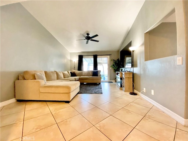743 N Beechwood Ave, Rialto, CA 92376 - living area featuring vaulted ceiling, a ceiling fan, and light tile patterned flooring