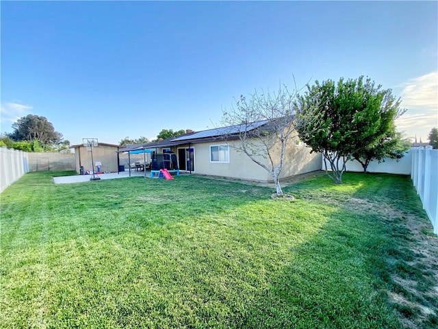 743 N Beechwood Ave, Rialto, CA 92376 - fenced backyard featuring a patio area