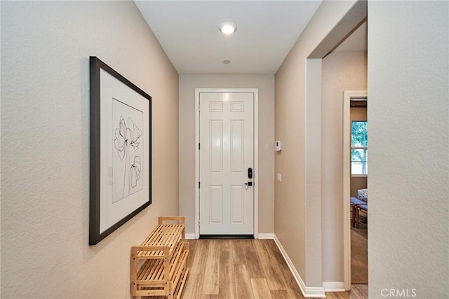 3430 E Foxglove Way, Ontario, CA 91761 - foyer entrance with light wood-type flooring and baseboards