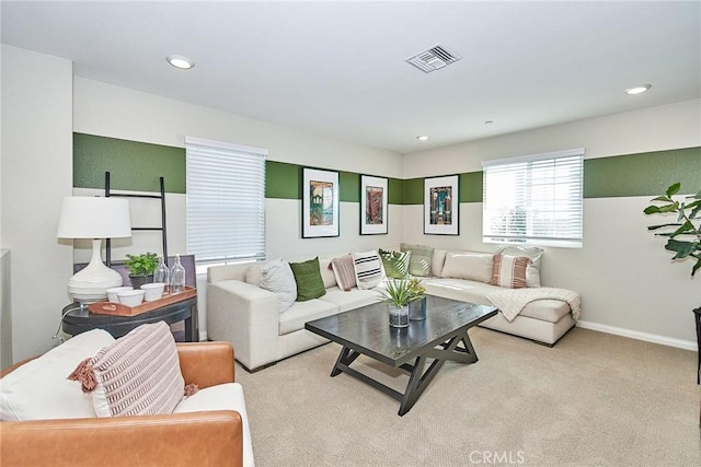 3430 E Foxglove Way, Ontario, CA 91761 - living room featuring light carpet, recessed lighting, and baseboards