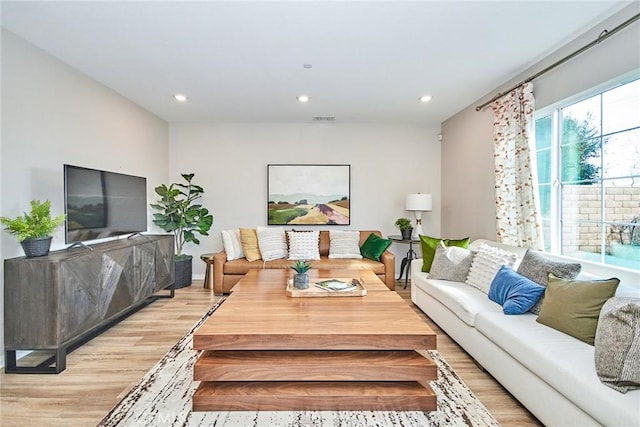 3430 E Foxglove Way, Ontario, CA 91761 - living room featuring light wood-type flooring and recessed lighting
