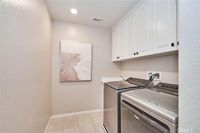 3430 E Foxglove Way, Ontario, CA 91761 - laundry area with cabinet space, independent washer and dryer, light tile patterned floors, baseboards, and recessed lighting