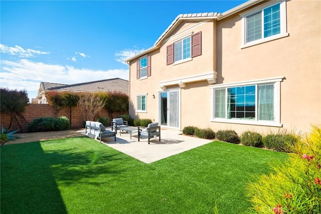 3430 E Foxglove Way, Ontario, CA 91761 - rear view of house with a patio area, stucco siding, and an outdoor living space