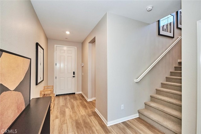 3430 E Foxglove Way, Ontario, CA 91761 - entryway with light wood-type flooring, baseboards, stairs, and recessed lighting