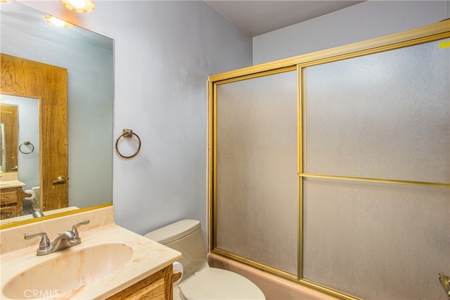 6429 Cedar Ave, Angelus Oaks, CA 92305 - full bathroom with toilet, vanity, and combined bath / shower with glass door