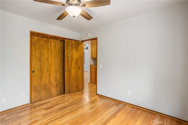 6429 Cedar Ave, Angelus Oaks, CA 92305 - unfurnished bedroom with light wood-style flooring, a closet, and ceiling fan