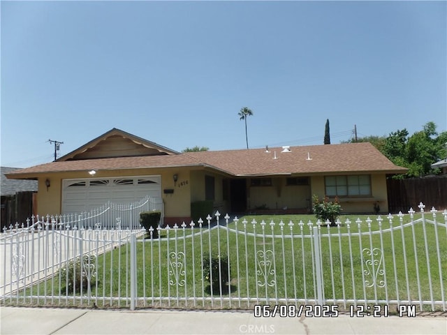 1676 Dumbarton Ave, San Bernardino, CA 92404 - single story home with a garage, stucco siding, and driveway