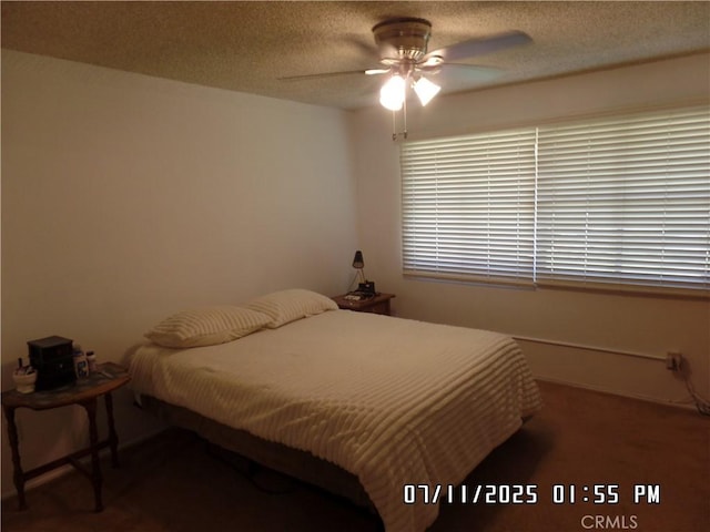 1676 Dumbarton Ave, San Bernardino, CA 92404 - bedroom featuring a textured ceiling and a ceiling fan
