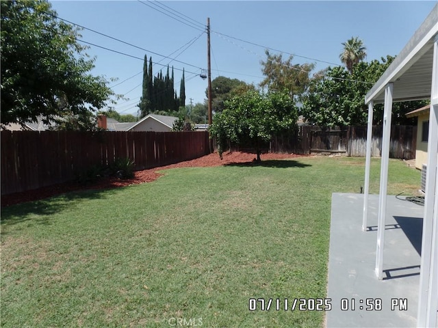 1676 Dumbarton Ave, San Bernardino, CA 92404 - fenced backyard featuring a patio area