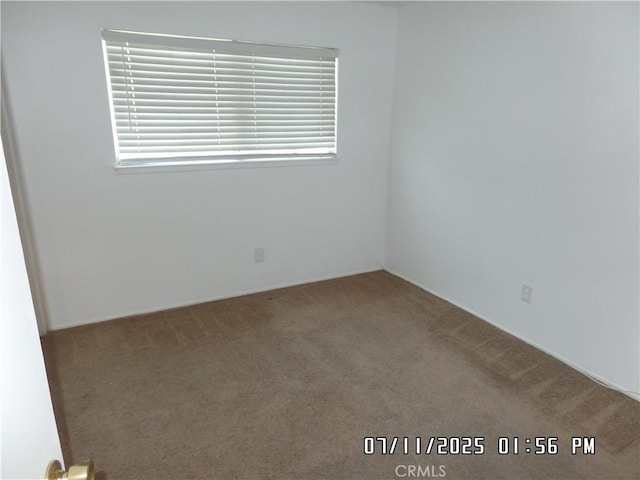 1676 Dumbarton Ave, San Bernardino, CA 92404 - spare room with carpet flooring
