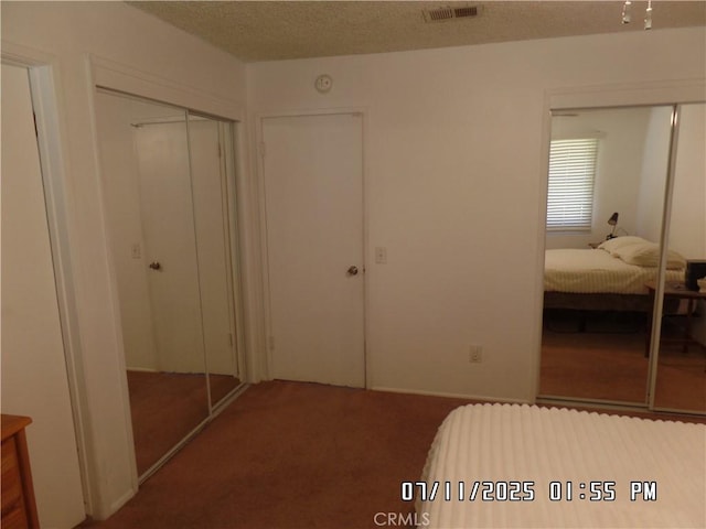 1676 Dumbarton Ave, San Bernardino, CA 92404 - carpeted bedroom with a closet