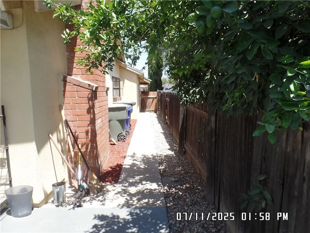 1676 Dumbarton Ave, San Bernardino, CA 92404 - view of side of home with stucco siding