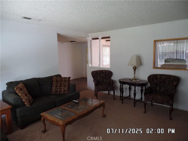 1676 Dumbarton Ave, San Bernardino, CA 92404 - living area with a textured ceiling and carpet floors