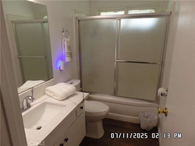 1676 Dumbarton Ave, San Bernardino, CA 92404 - full bath featuring vanity and shower / bath combination with glass door