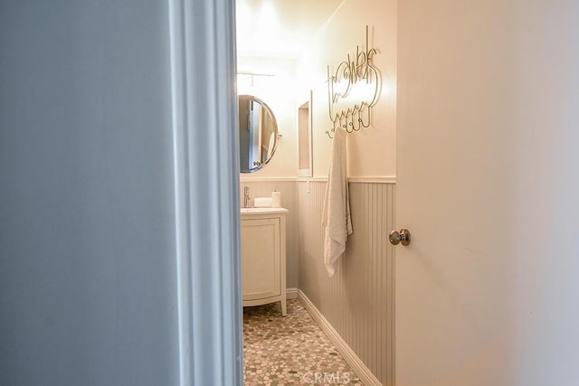 188 Temple Ave Unit 201, Long Beach, CA 90803 - bathroom featuring vanity and a wainscoted wall
