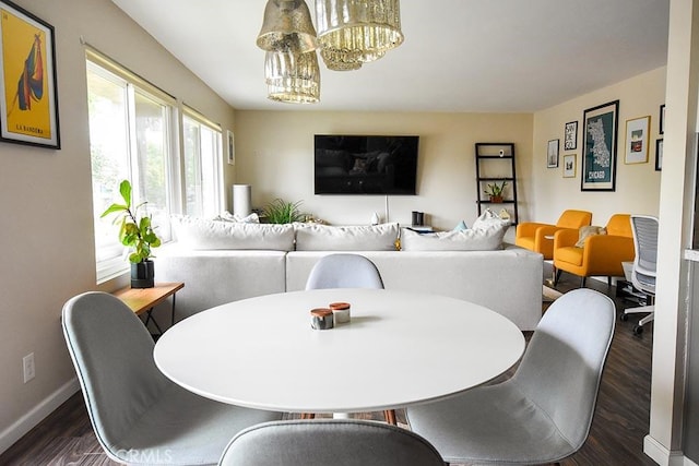 188 Temple Ave Unit 201, Long Beach, CA 90803 - dining room featuring dark wood-style floors, a chandelier, and baseboards