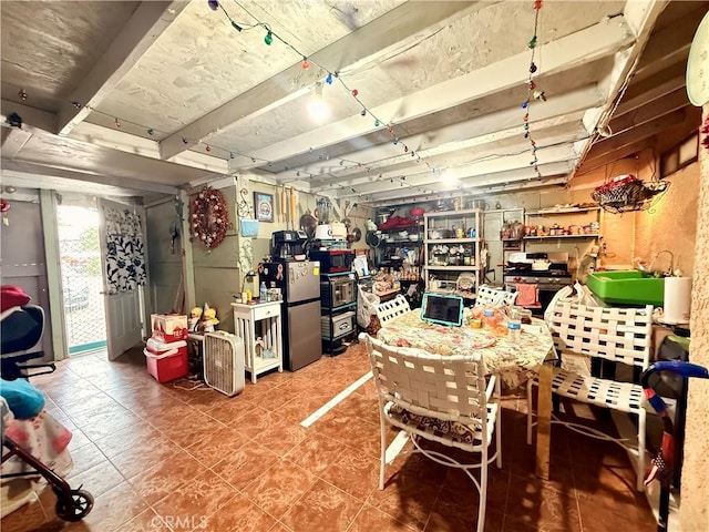 15994 Cactus St, Hesperia, CA 92345 - below grade area with freestanding refrigerator and tile patterned floors