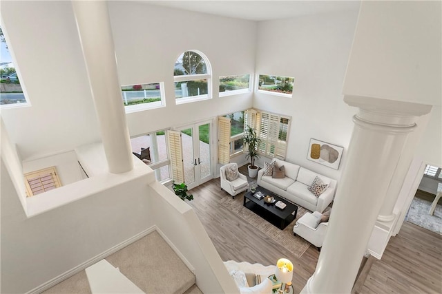 11 Porto Cervo Dr, Dana Point, CA 92629 - living room with a towering ceiling, wood finished floors, and french doors