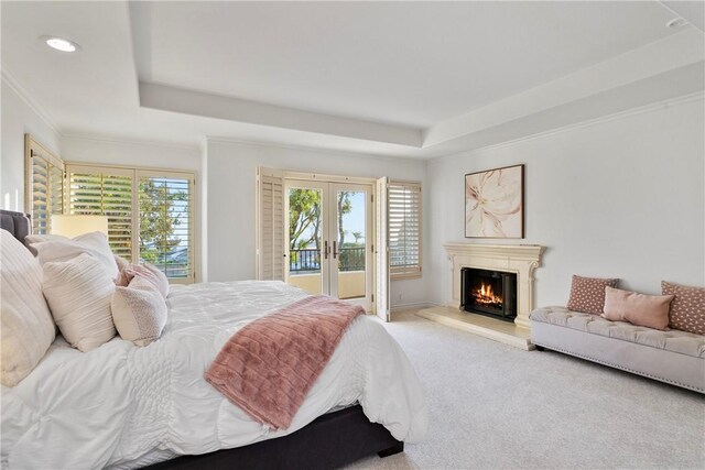 11 Porto Cervo Dr, Dana Point, CA 92629 - bedroom featuring a tray ceiling, access to exterior, carpet flooring, multiple windows, and recessed lighting
