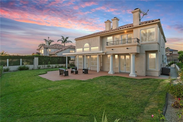11 Porto Cervo Dr, Dana Point, CA 92629 - back of house featuring a balcony, french doors, a patio area, a chimney, and stucco siding