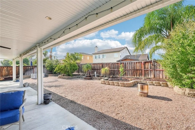 29595 Pleasant Paseo Cv, Menifee, CA 92585 - fenced backyard featuring a patio