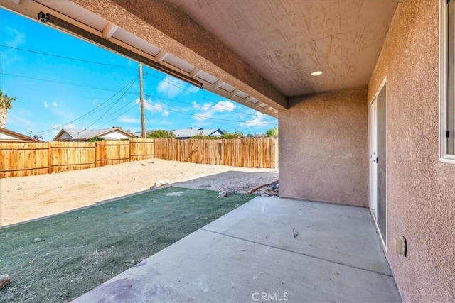 7415 Saladin Ave Unit 29, Palms, CA 92277 - fenced backyard with a patio