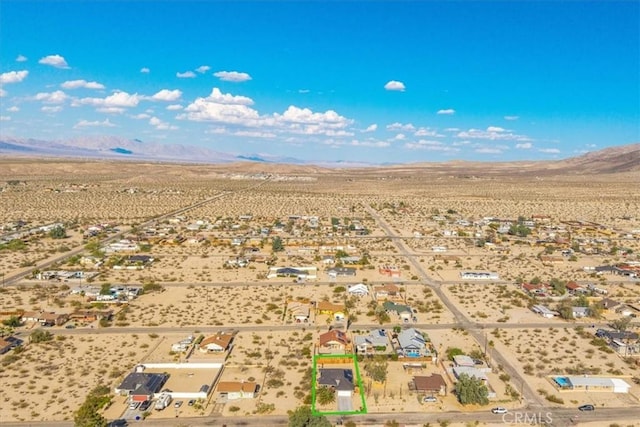 7415 Saladin Ave Unit 29, Palms, CA 92277 - view of rural area with mountains, a desert landscape, and property parcel outlined