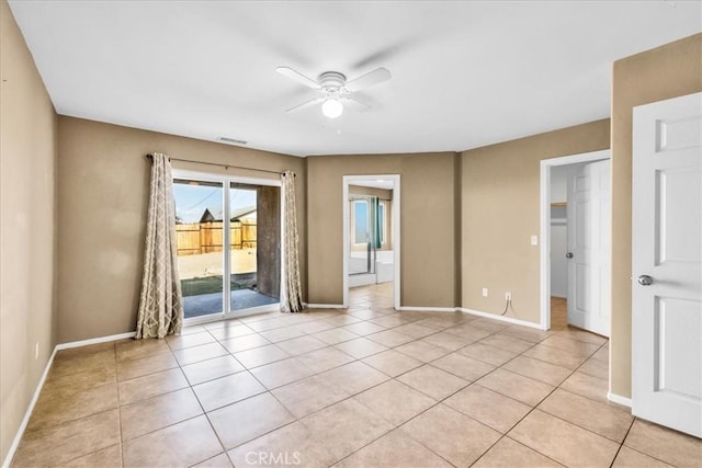 7415 Saladin Ave Unit 29, Palms, CA 92277 - unfurnished room with ceiling fan, baseboards, and light tile patterned flooring