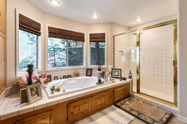 430 Rainier Rd, Lake Arrowhead, CA 92352 - full bathroom with a stall shower, a tub with jets, and recessed lighting