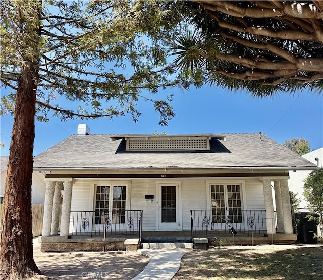 542 Ojai Rd, Santa Paula, CA 93060 - bungalow with a porch, a chimney, and a shingled roof