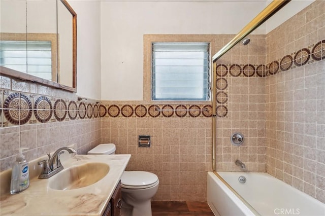 542 Ojai Rd, Santa Paula, CA 93060 - full bath featuring tile walls, shower / tub combination, vanity, and a wainscoted wall