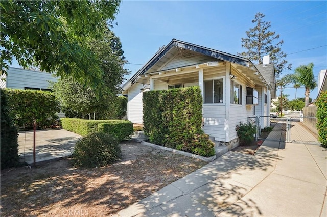 542 Ojai Rd, Santa Paula, CA 93060 - view of property exterior featuring a gate and a chimney