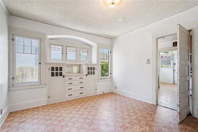542 Ojai Rd, Santa Paula, CA 93060 - foyer entrance with plenty of natural light, a textured ceiling, and light flooring