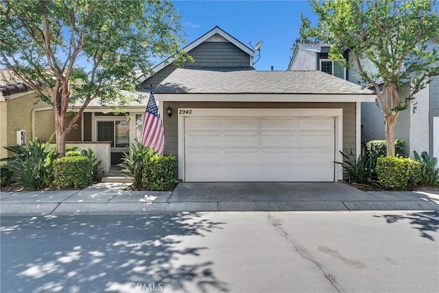 2940 Cherry Way, Ontario, CA 91761 - view of front of property with driveway and a garage