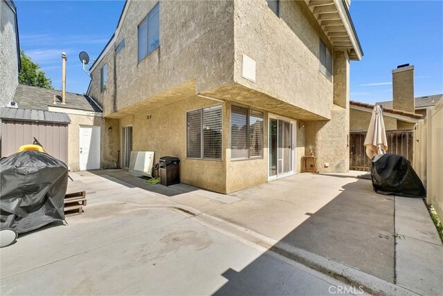 2940 Cherry Way, Ontario, CA 91761 - rear view of property with a patio area and stucco siding