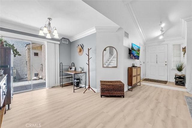2940 Cherry Way, Ontario, CA 91761 - foyer featuring light wood-style flooring, ornamental molding, a chandelier, and baseboards