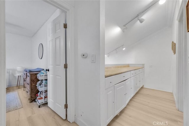 2940 Cherry Way, Ontario, CA 91761 - bathroom featuring rail lighting, vanity, and wood finished floors