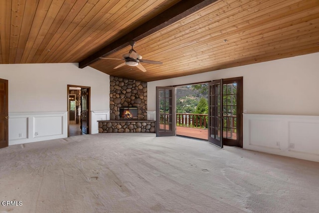 11395 Highridge Ct, Camarillo, CA 93012 - unfurnished living room featuring a fireplace, wood ceiling, wainscoting, carpet, and a ceiling fan