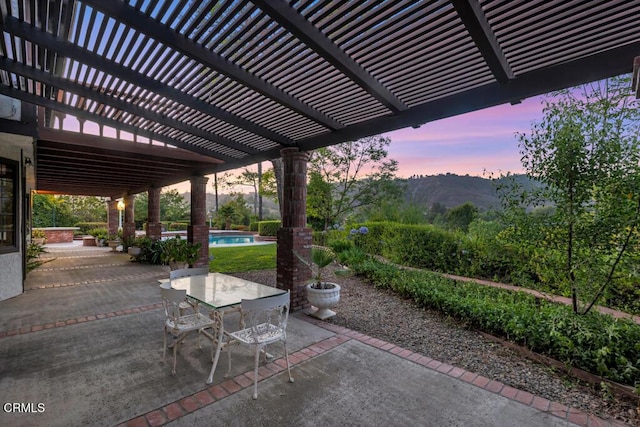 11395 Highridge Ct, Camarillo, CA 93012 - view of patio / terrace featuring a pergola, an outdoor pool, outdoor dining space, and a mountain view