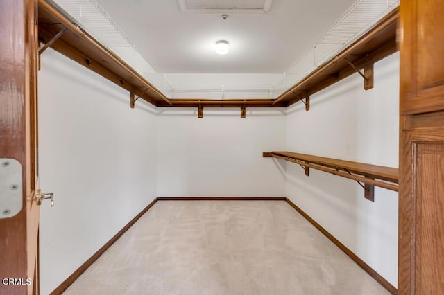 11395 Highridge Ct, Camarillo, CA 93012 - walk in closet featuring light colored carpet