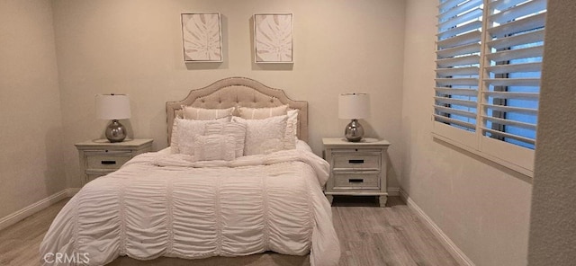 14332 Hibiscus Ct, Westminster, CA 92683 - bedroom featuring wood finished floors and baseboards