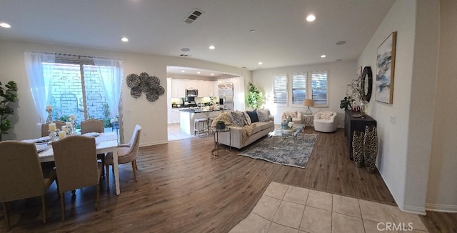 14332 Hibiscus Ct, Westminster, CA 92683 - dining area featuring wood finished floors, healthy amount of natural light, recessed lighting, and baseboards