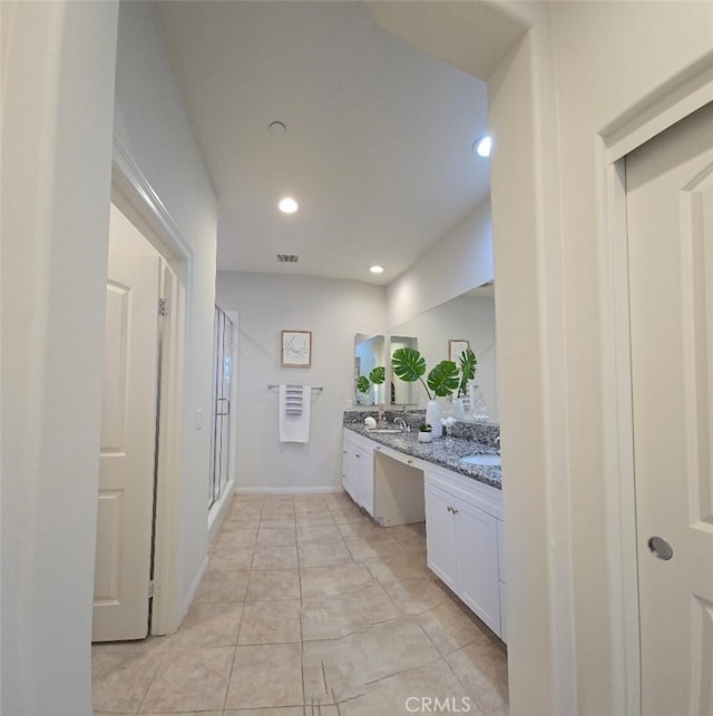 14332 Hibiscus Ct, Westminster, CA 92683 - bathroom with double vanity, a shower stall, recessed lighting, and tile patterned floors