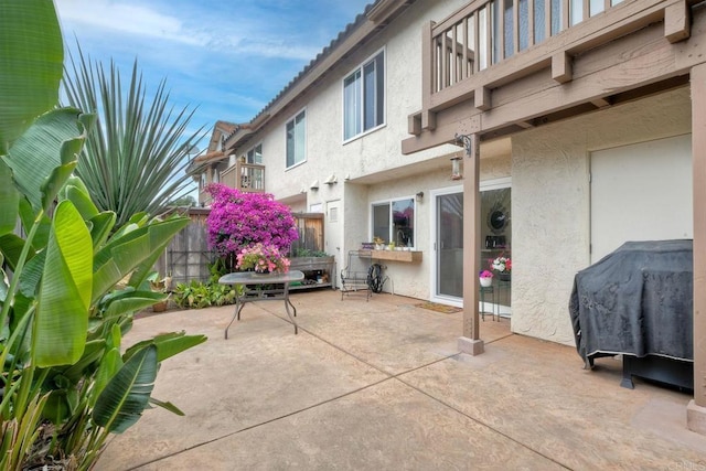 1651 S Juniper St Unit 106, Escondido, CA 92025 - view of patio with grilling area and a balcony
