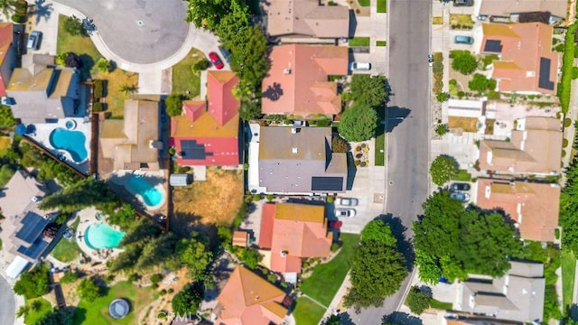 3475 Paseo Verde Ave, Merced, CA 95348 - aerial view of property and surrounding area with a pool and nearby suburban area