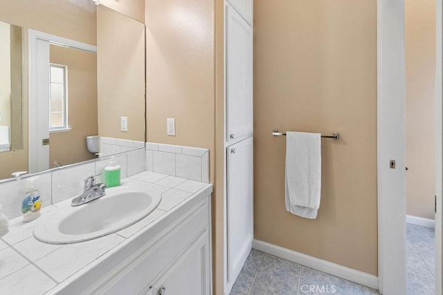3475 Paseo Verde Ave, Merced, CA 95348 - bathroom featuring vanity, baseboards, and tile patterned floors